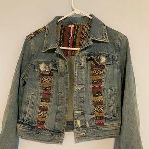 Woman’s free people size 2 embroidered distressed denim jacket